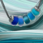 Elfbeads Light Ocean Blue Frost blue; silver glass Bead by The Alternative Bead. Your official Elfbeads Retailer from Germany