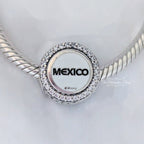 Disney x Pandora Mickey Mouse Mexico (EPCOT World Showcase) silver and white and blue and beige sterling-silver and enamel Bead by The Alternative Bead. Your official Disney x Pandora Retailer from Germany