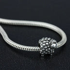 OHM Beads Curly Sheep (Retired)  sterling-silver Bead The Alternative Bead