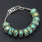 OHM Beads Travel Abroad (AMG140)  sterling-silver Bead The Alternative Bead