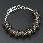 OHM Beads Heimdall  black; gold glass Bead by The Alternative Bead. Your official OHM Beads Retailer from Germany