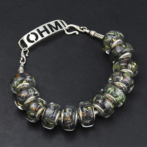OHM Beads Autumn Glimmers black glass Bead by The Alternative Bead. Your official OHM Beads Retailer from Germany