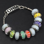 OHM Beads GOTM NO. 43 Fortune's Spiral  glass Bead by The Alternative Bead. Your official OHM Beads Retailer from Germany