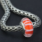 OHM Beads GOTM NO. 43 Fortune's Spiral  glass Bead by The Alternative Bead. Your official OHM Beads Retailer from Germany