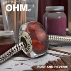 OHM Beads Rust And Reverie red glass Bead by The Alternative Bead. Your official OHM Beads Retailer from Germany
