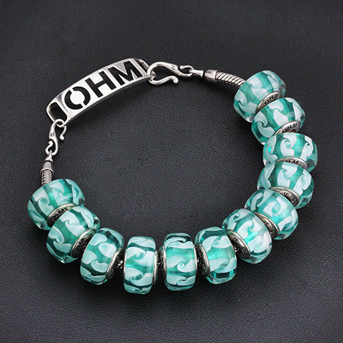 OHM Beads Wave of Mystery blue glass Bead by The Alternative Bead. Your official OHM Beads Retailer from Germany