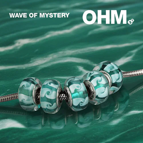 OHM Beads Wave of Mystery blue glass Bead by The Alternative Bead. Your official OHM Beads Retailer from Germany