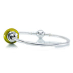 Aurora Charm Autumn Morning Murano Glass Bead yellow; green glass Bead by The Alternative Bead. Your official Aurora Charm Retailer from Germany