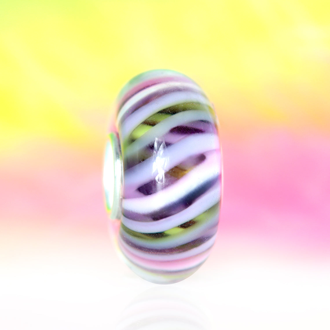 Ogerbeads Bead of the Month July – 2024 pink and green and purple glass Bead by The Alternative Bead. Your official Ogerbeads Retailer from Germany