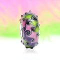 Ogerbeads Bead of the Month June – 2024 green and pink and purple glass Bead by The Alternative Bead. Your official Ogerbeads Retailer from Germany
