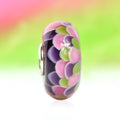 Ogerbeads Bead of the Month March – 2024 pink and green and purple glass Bead by The Alternative Bead. Your official Ogerbeads Retailer from Germany
