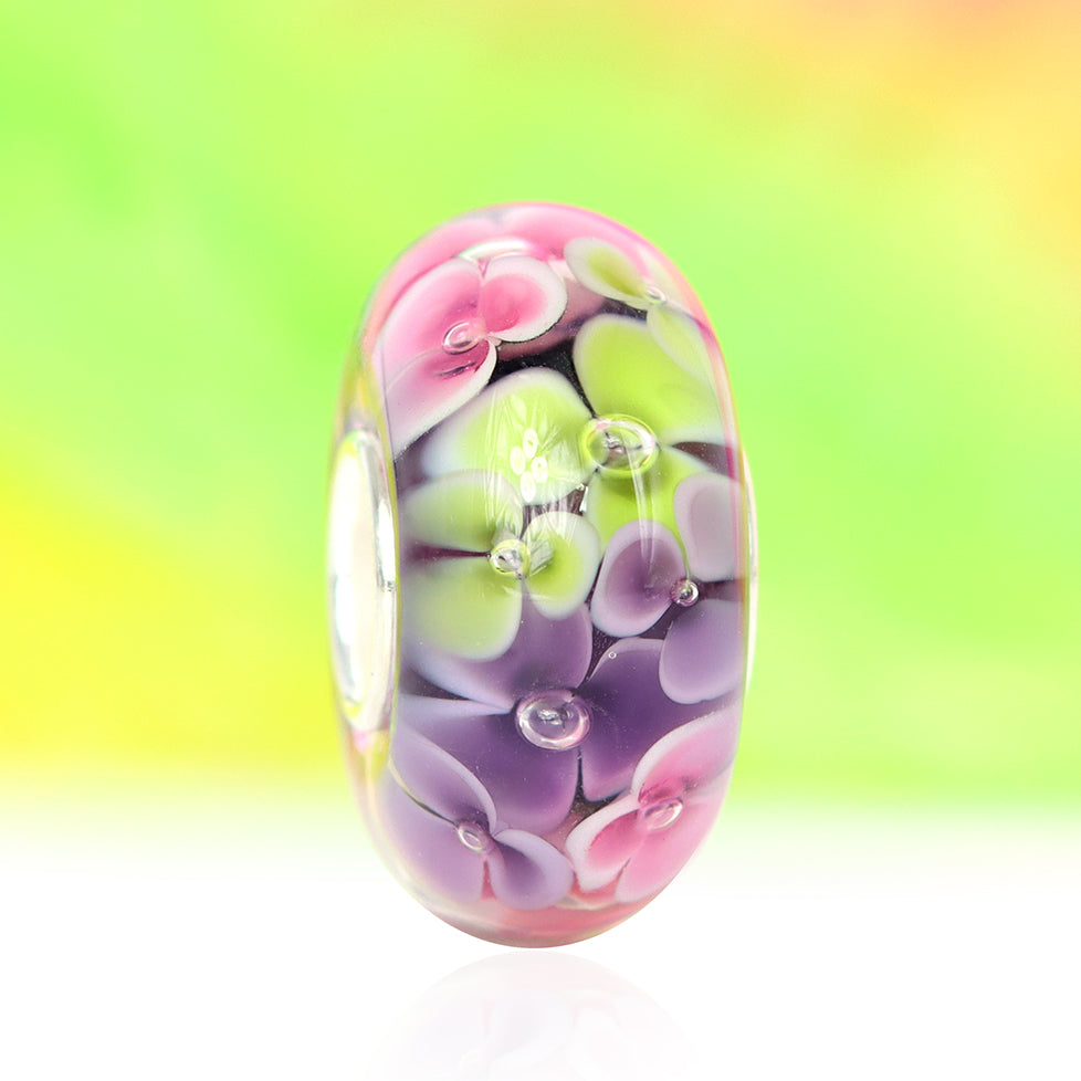 Ogerbeads Bead of the Month May – 2024 pink and green and purple glass Bead by The Alternative Bead. Your official Ogerbeads Retailer from Germany