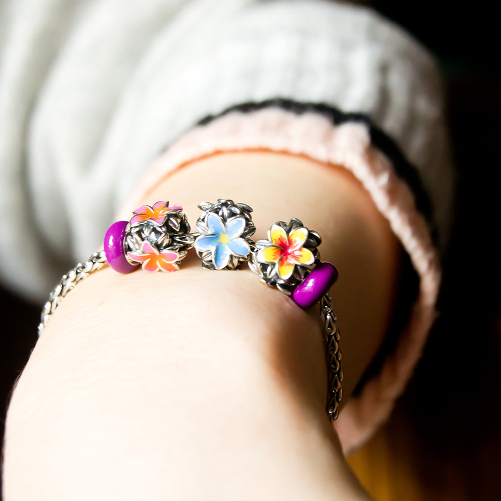Aurora Charm Frangipani Blue Yellow Flower Charm silver; yellow; blue sterling-silver; enamel Bead by The Alternative Bead. Your official Aurora Charm Retailer from Germany