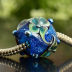 VIP-CHARMS Ocean Bloom Bead blue; green glass Bead by The Alternative Bead. Your official VIP-CHARMS Retailer from Germany