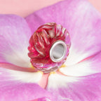 Elfbeads Cherry Gold Sprinkles Roll red; silver glass Bead by The Alternative Bead. Your official Elfbeads Retailer from Germany