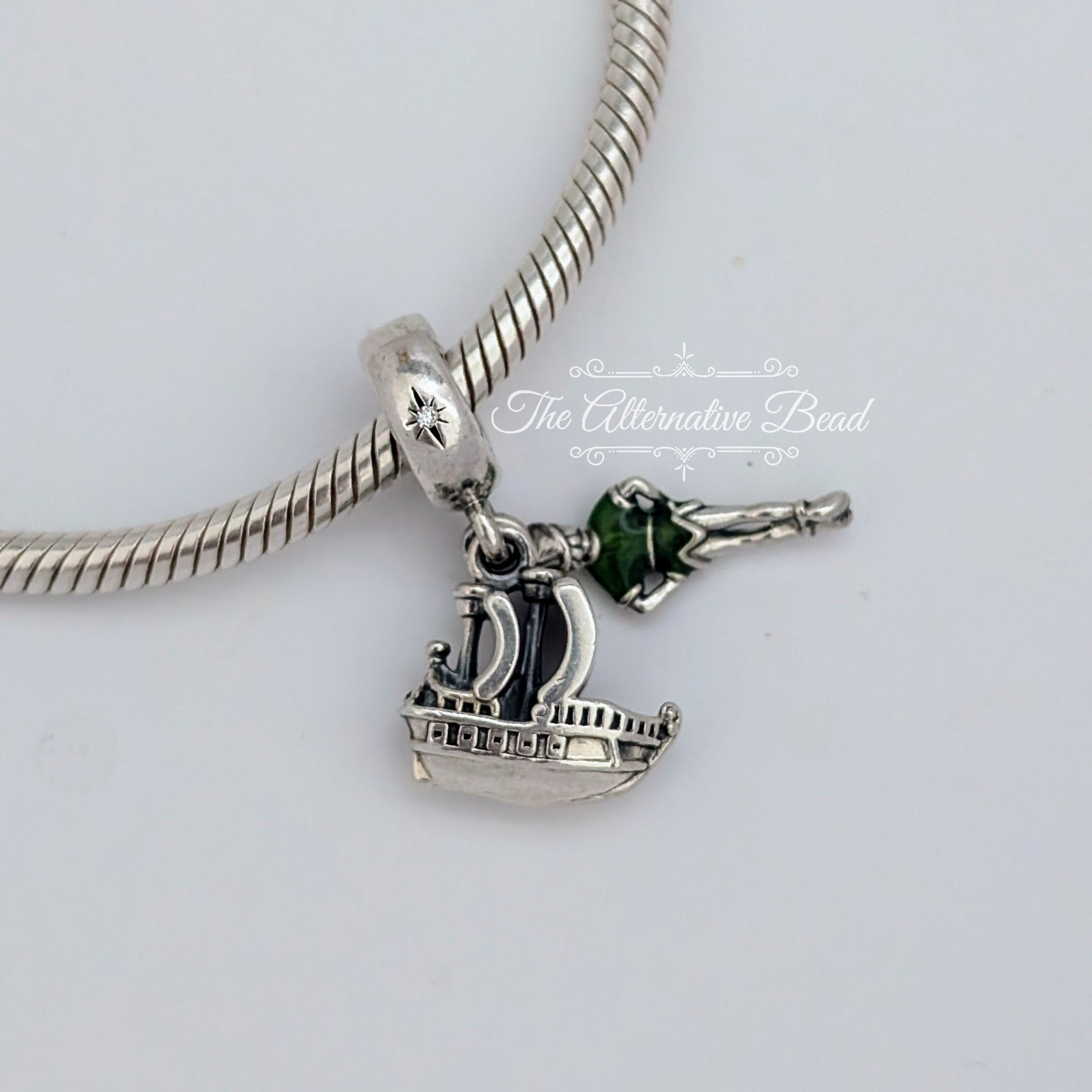 Disney x Pandora Peter Pan & The Jolly Roger Dangle silver and green sterling-silver and enamel Dangle by The Alternative Bead. Your official Disney x Pandora Retailer from Germany
