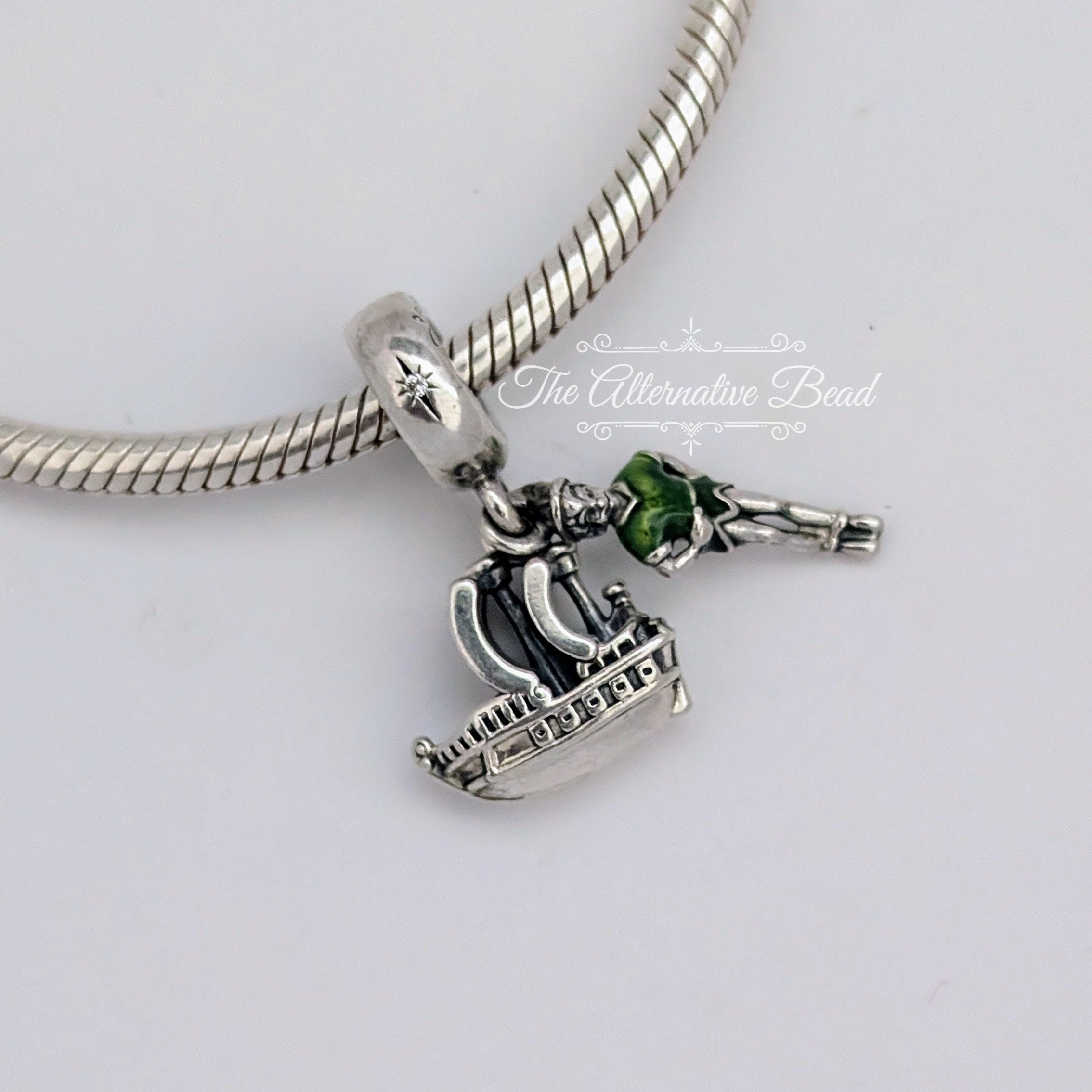 Disney x Pandora Peter Pan & The Jolly Roger Dangle silver and green sterling-silver and enamel Dangle by The Alternative Bead. Your official Disney x Pandora Retailer from Germany