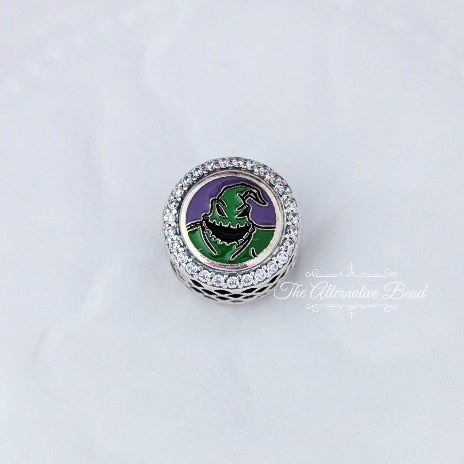 Disney x Pandora Oogie Boogie Engravable green and purple sterling-silver and enamel Bead by The Alternative Bead. Your official Disney x Pandora Retailer from Germany