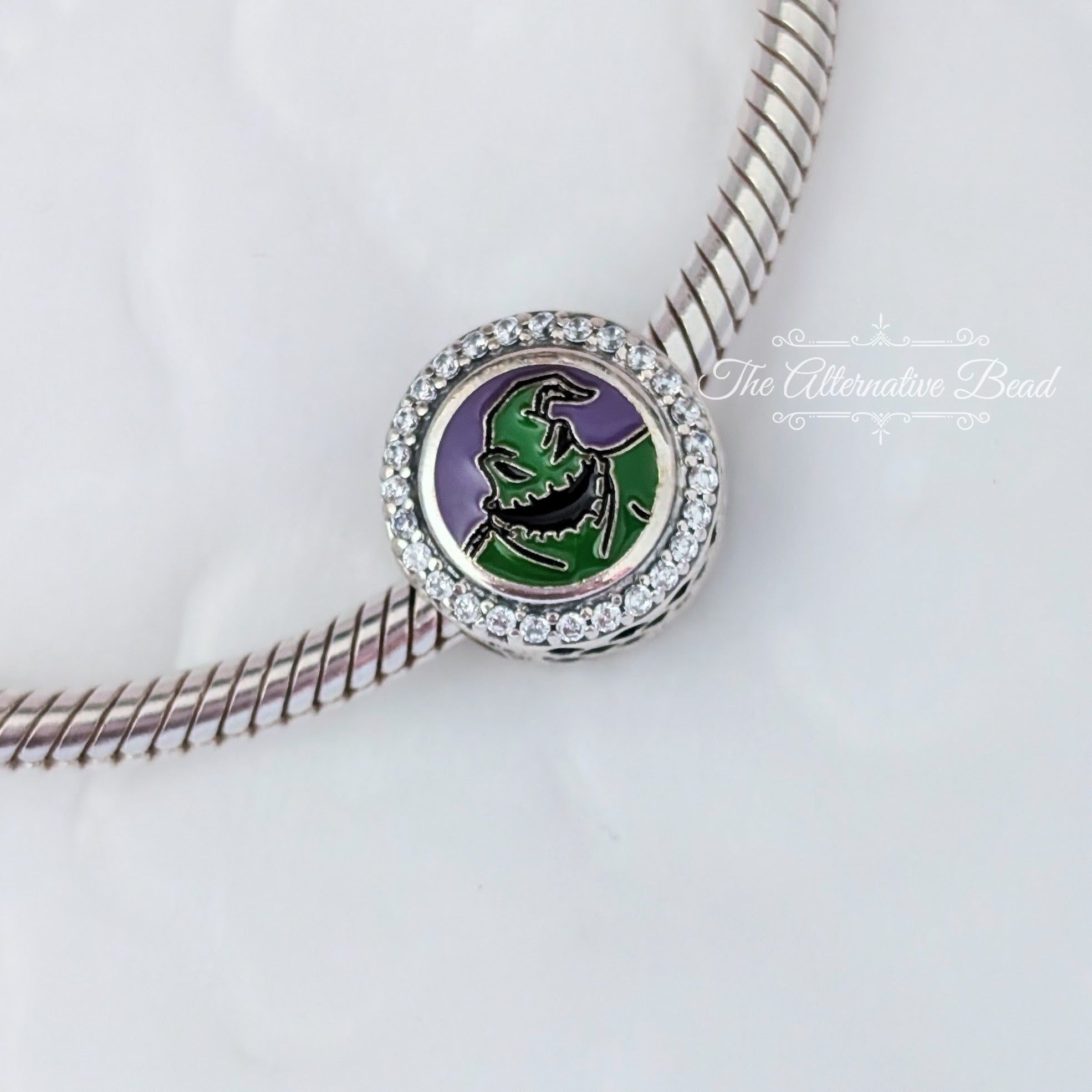 Disney x Pandora Oogie Boogie Engravable green and purple sterling-silver and enamel Bead by The Alternative Bead. Your official Disney x Pandora Retailer from Germany