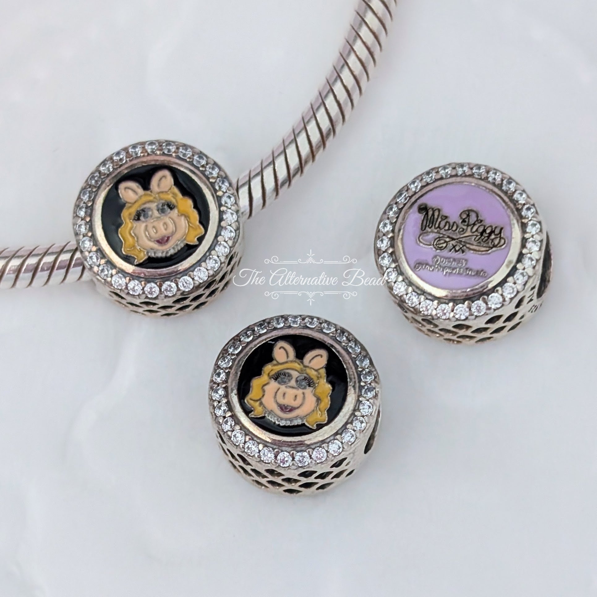 Disney x Pandora Miss Piggy Engravable Charm pink sterling-silver and enamel Bead by The Alternative Bead. Your official Disney x Pandora Retailer from Germany