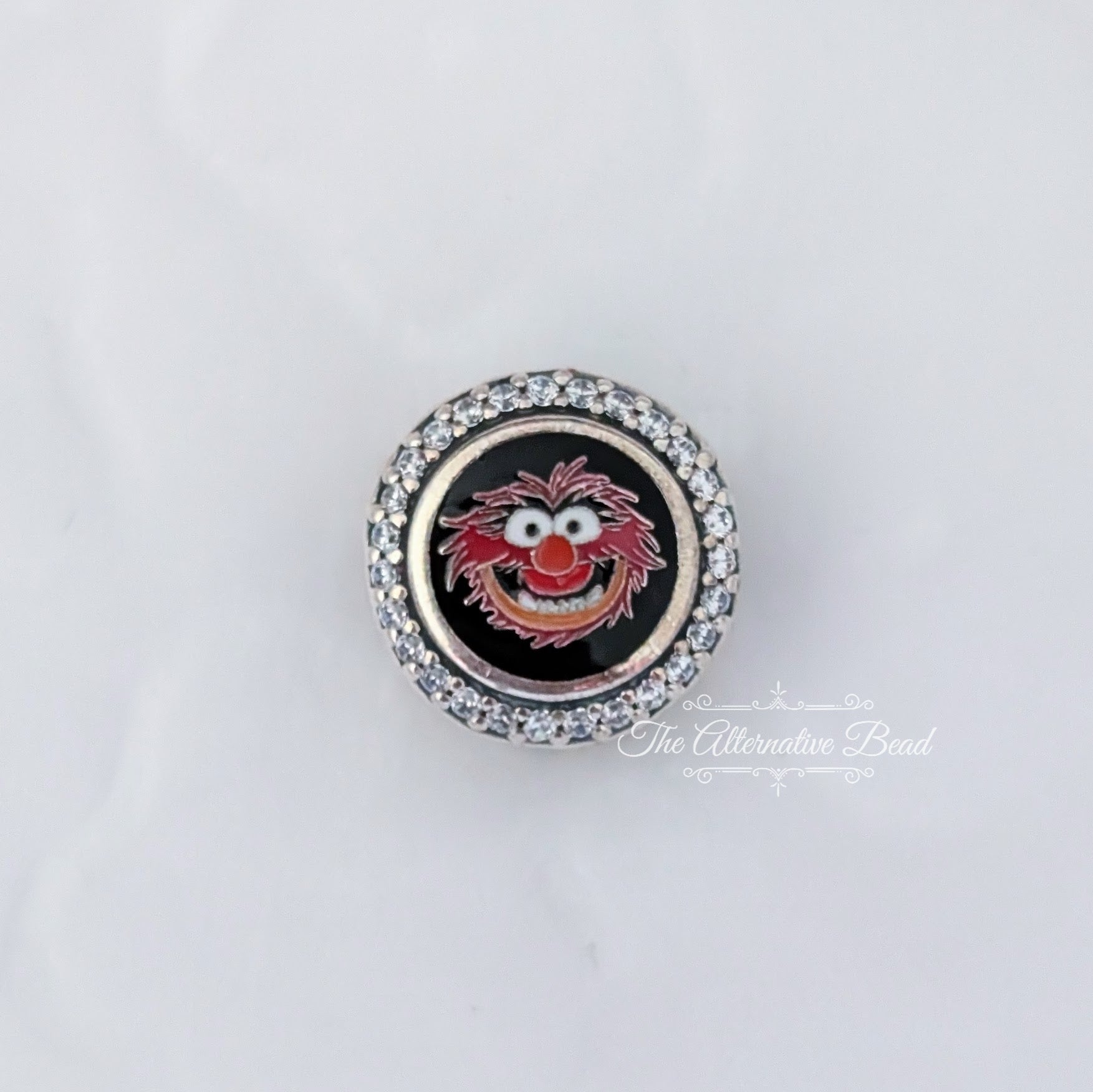 Disney x Pandora Animal Button Charm silver and red sterling-silver and enamel Bead by The Alternative Bead. Your official Disney x Pandora Retailer from Germany