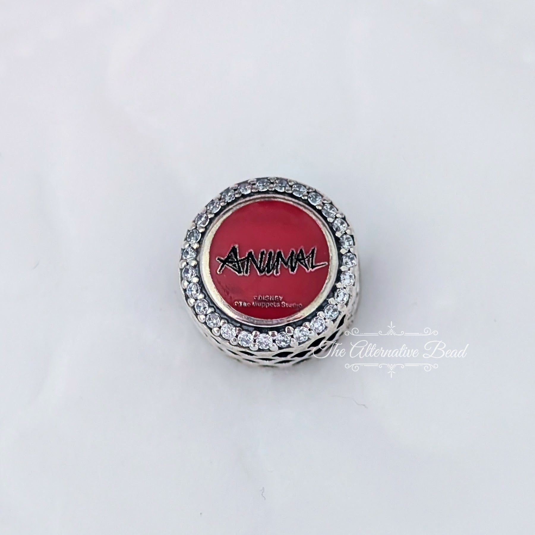 Disney x Pandora Animal Button Charm silver and red sterling-silver and enamel Bead by The Alternative Bead. Your official Disney x Pandora Retailer from Germany