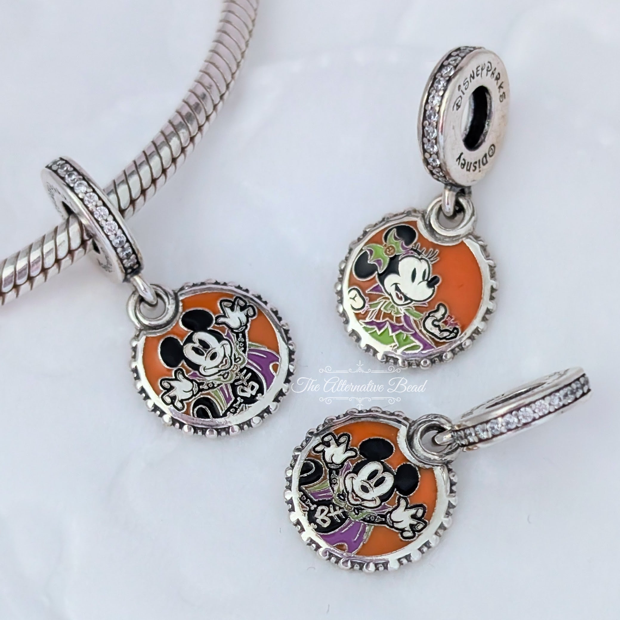 Disney x Pandora Mickey & Minnie Halloween 2024 Dangle orange sterling-silver and enamel Dangle by The Alternative Bead. Your official Disney x Pandora Retailer from Germany