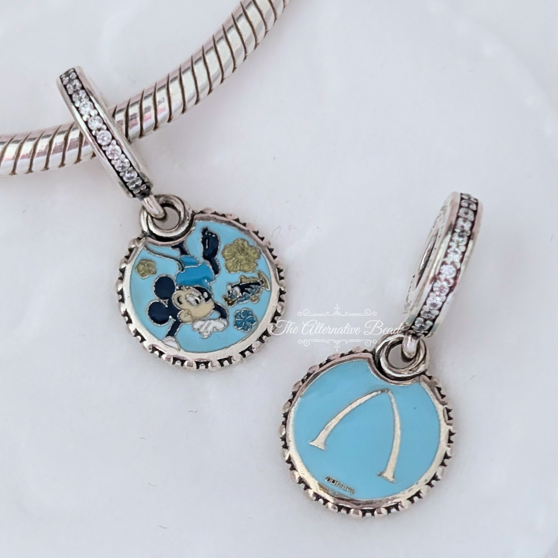 Disney x Pandora Mickey Mouse Aulani Diving Dangle blue sterling-silver and enamel Dangle by The Alternative Bead. Your official Disney x Pandora Retailer from Germany