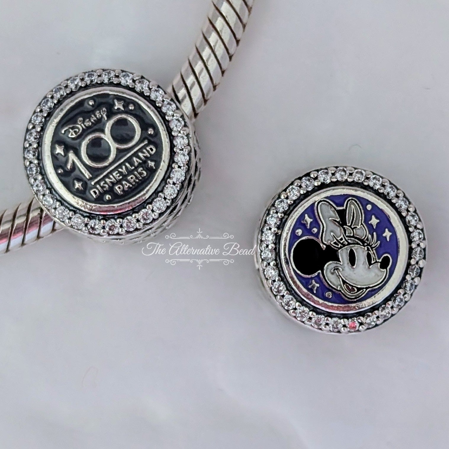 Disney x Pandora Disney 100th Anniversary Minnie blue and silver sterling-silver and enamel Bead by The Alternative Bead. Your official Disney x Pandora Retailer from Germany