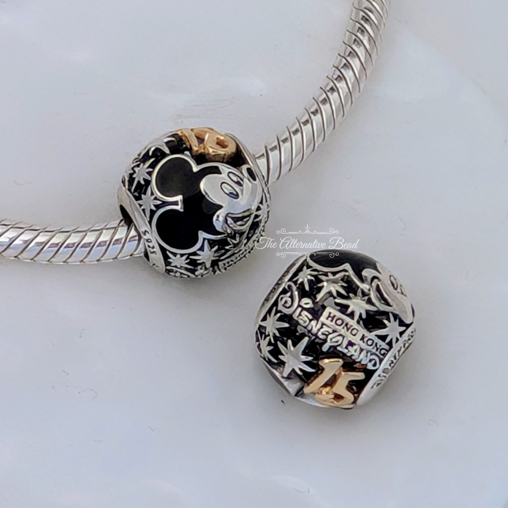 Disney x Pandora Hong Kong Disneyland 15h Anniversary Bicolor silver and gold sterling-silver and gold Bead by The Alternative Bead. Your official Disney x Pandora Retailer from Germany