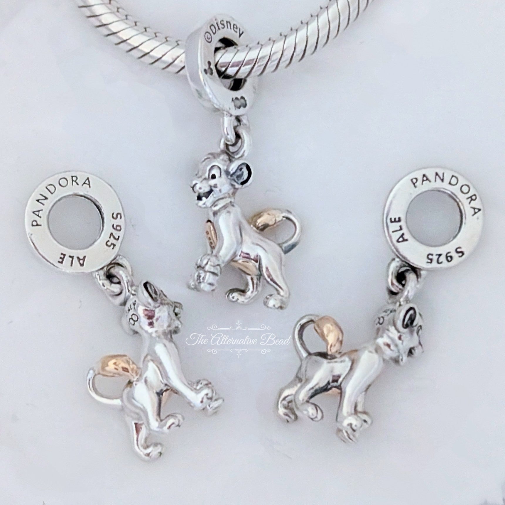 Disney x Pandora Disney 100th Anniversary Simba Lab-grown Diamond Dangle Charm silver and gold sterling-silver and gold and diamond Dangle by The Alternative Bead. Your official Disney x Pandora Retailer from Germany