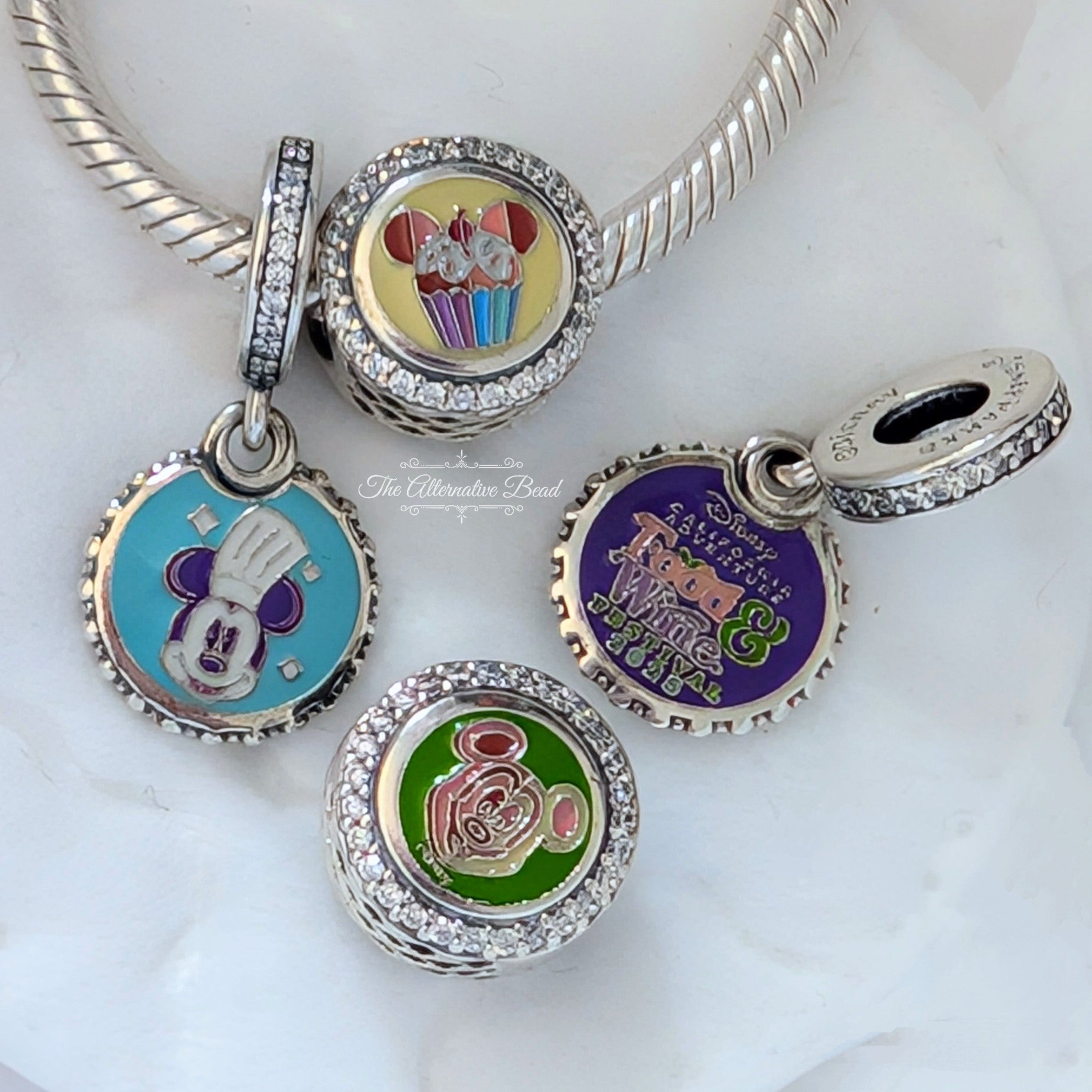 Disney x Pandora EPCOT Food & Wine Festival Set 2025 silver and blue and yellow sterling-silver and enamel Collectors Set by The Alternative Bead. Your official Disney x Pandora Retailer from Germany