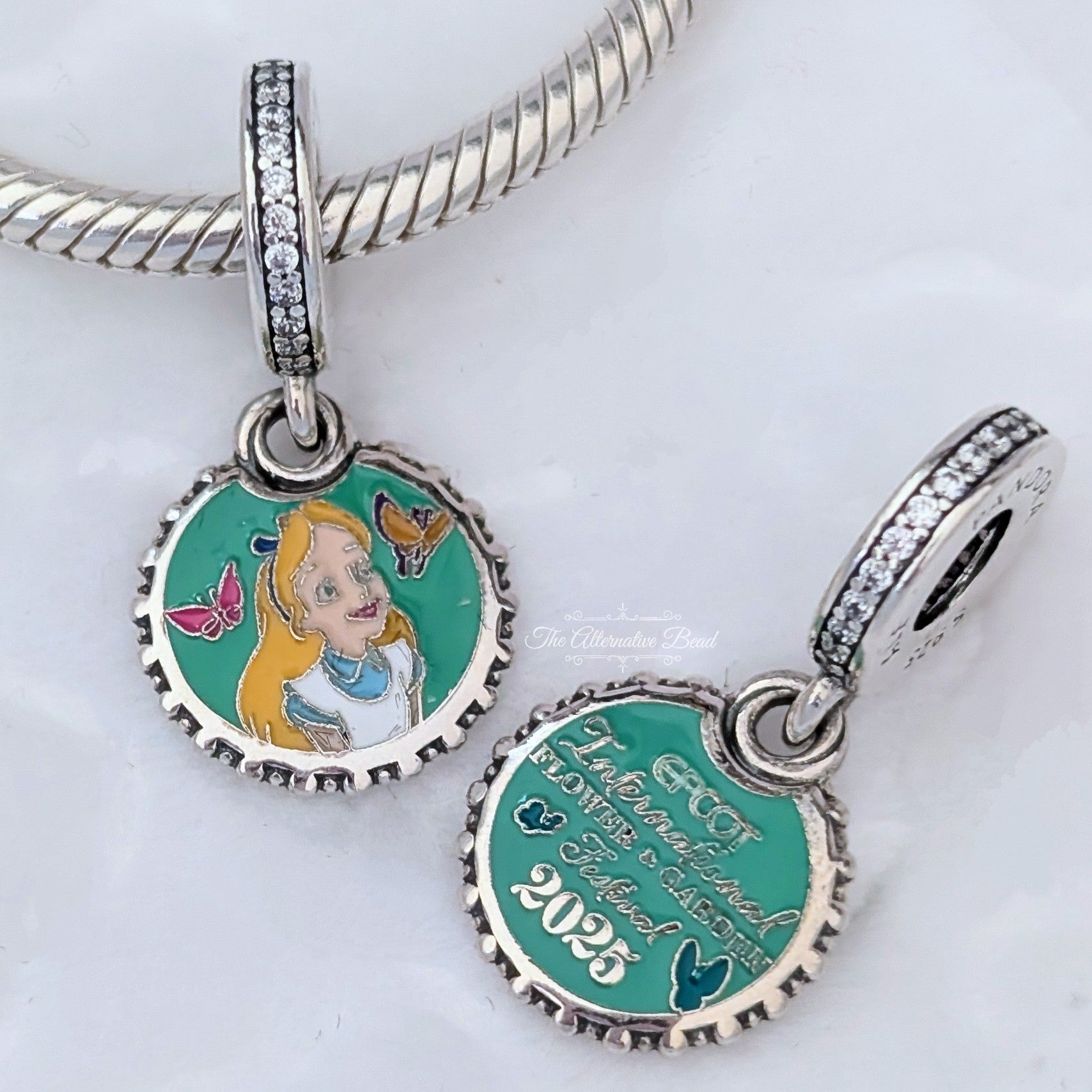 Disney x Pandora EPCOT Flower Garden Festival Set Alice in Wonderland 2025 silver and purple and green sterling-silver and enamel Collectors Set by The Alternative Bead. Your official Disney x Pandora Retailer from Germany