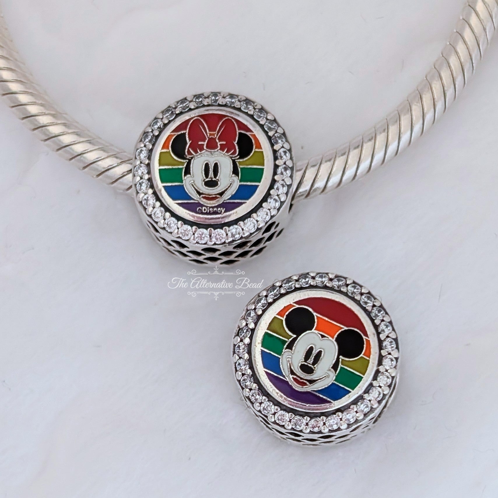 Disney x Pandora Pride Mickey & Minnie double sided Charm silver and rainbow sterling-silver and enamel Bead by The Alternative Bead. Your official Disney x Pandora Retailer from Germany