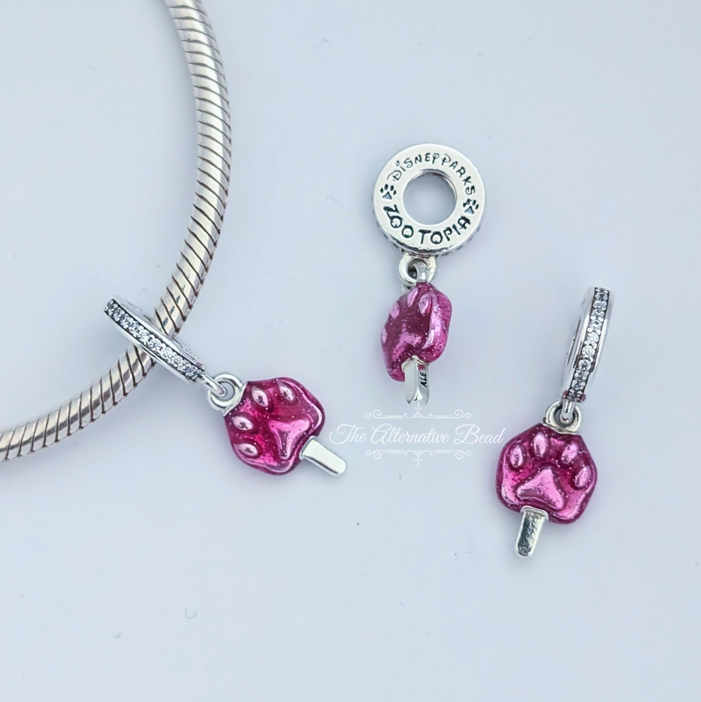 Disney x Pandora Zootopia Pawpsicle Dangle pink sterling-silver and enamel Dangle by The Alternative Bead. Your official Disney x Pandora Retailer from Germany