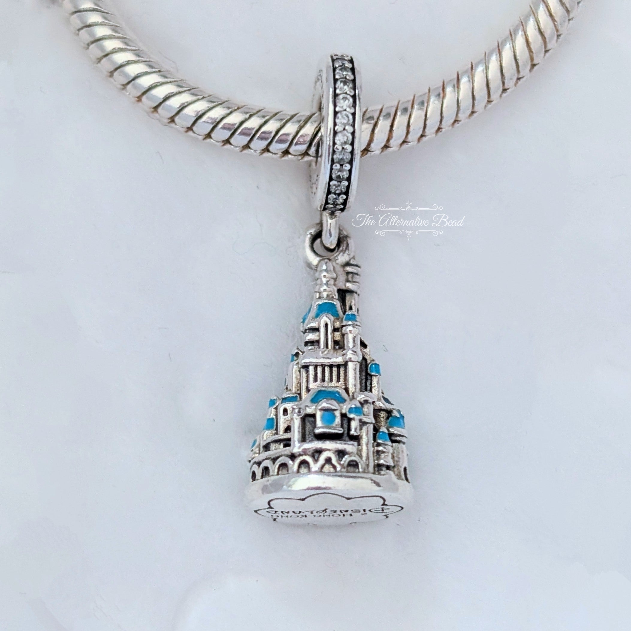 Disney x Pandora Exclusive Disneyland Hong Kong Castle Dangle silver and blue sterling-silver and enamel Dangle by The Alternative Bead. Your official Disney x Pandora Retailer from Germany