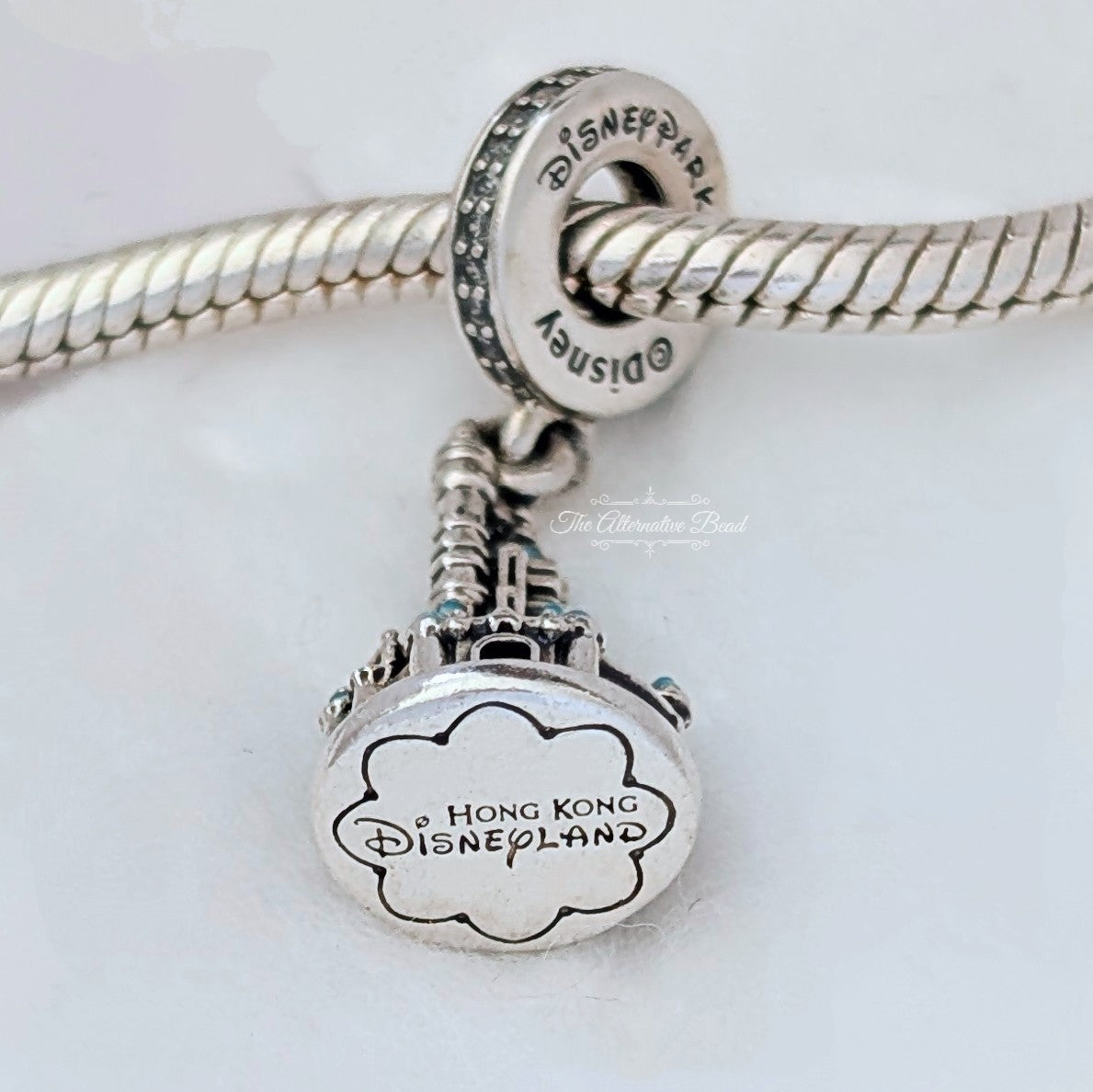 Disney x Pandora Exclusive Disneyland Hong Kong Castle Dangle silver and blue sterling-silver and enamel Dangle by The Alternative Bead. Your official Disney x Pandora Retailer from Germany
