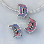 Disney x Pandora D Disneyland Logo Charm multicolor and silver and pink and purple sterling-silver and enamel Bead by The Alternative Bead. Your official Disney x Pandora Retailer from Germany