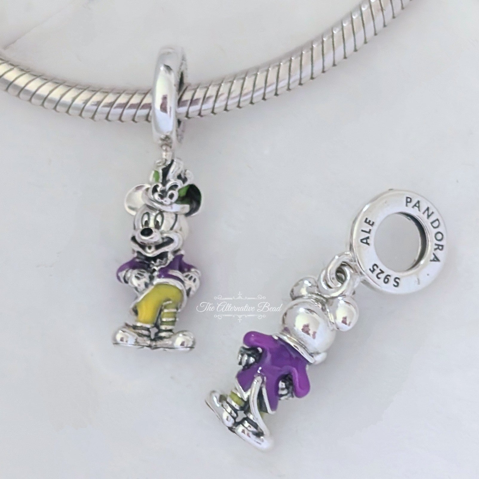 Disney x Pandora Mickey Mouse Parade Dangle silver and green and yellow and purple sterling-silver and enamel Dangle by The Alternative Bead. Your official Disney x Pandora Retailer from Germany