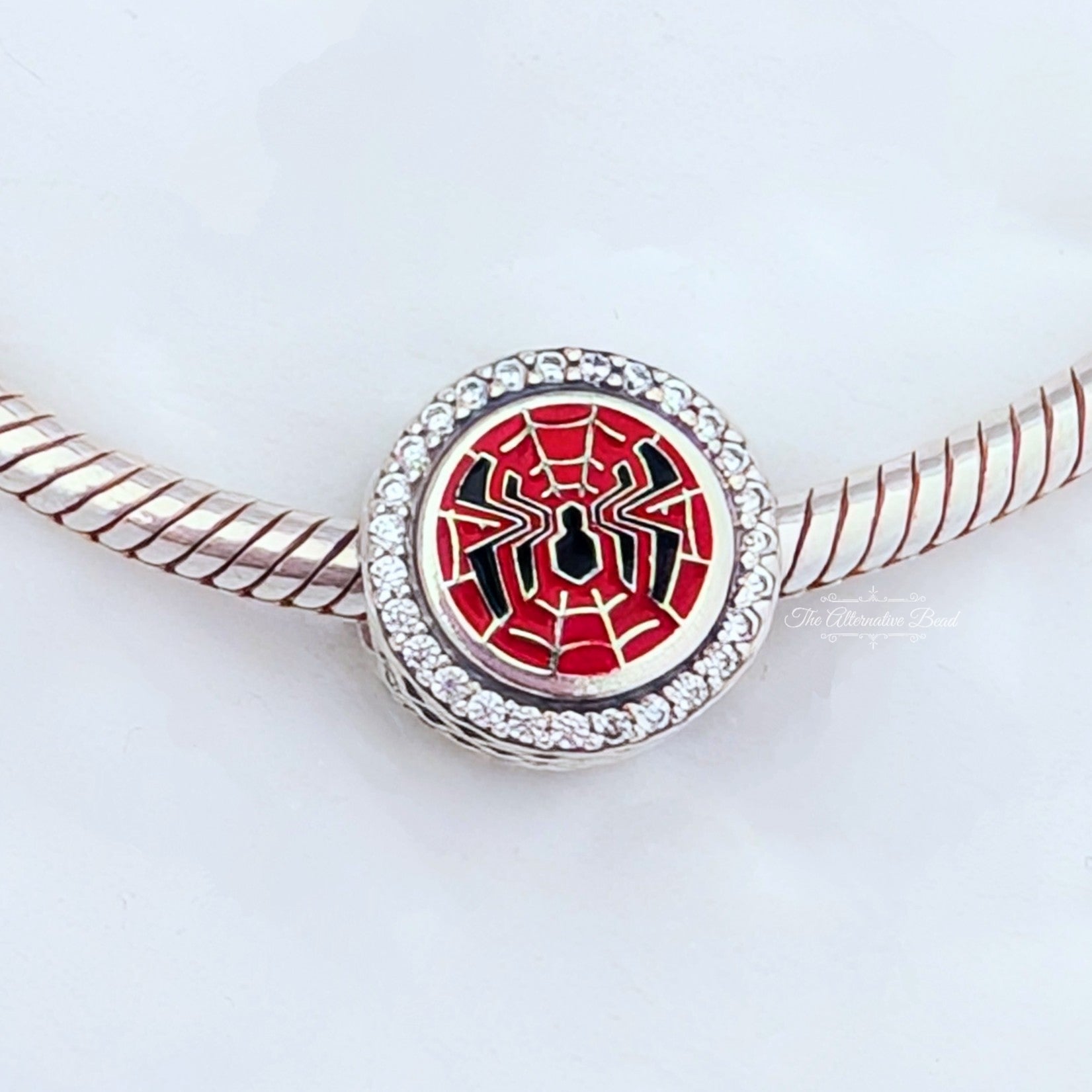 Marvel x Pandora Spider-Man WEB Worldwide Engineering Brigade Charm silver and red and black sterling-silver and enamel Bead by The Alternative Bead. Your official Marvel x Pandora Retailer from Germany