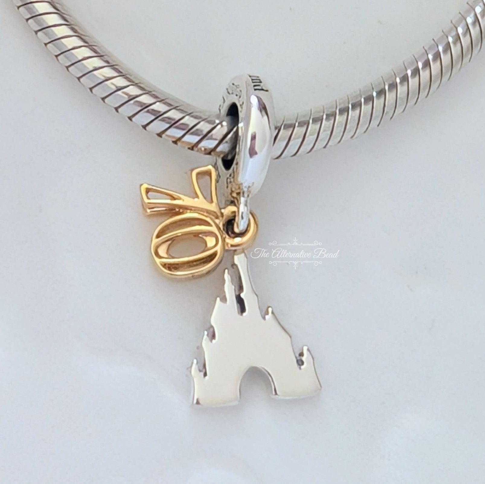 Disney x Pandora Disney Castle 70 Years Anniversary Charm Dangle silver and gold sterling-silver and gold-plated Dangle by The Alternative Bead. Your official Disney x Pandora Retailer from Germany