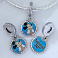 Disney x Pandora Mickey Mouse Disneyland 70th Anniversary Dangle Charm silver and blue and black and gold sterling-silver and enamel Dangle by The Alternative Bead. Your official Disney x Pandora Retailer from Germany