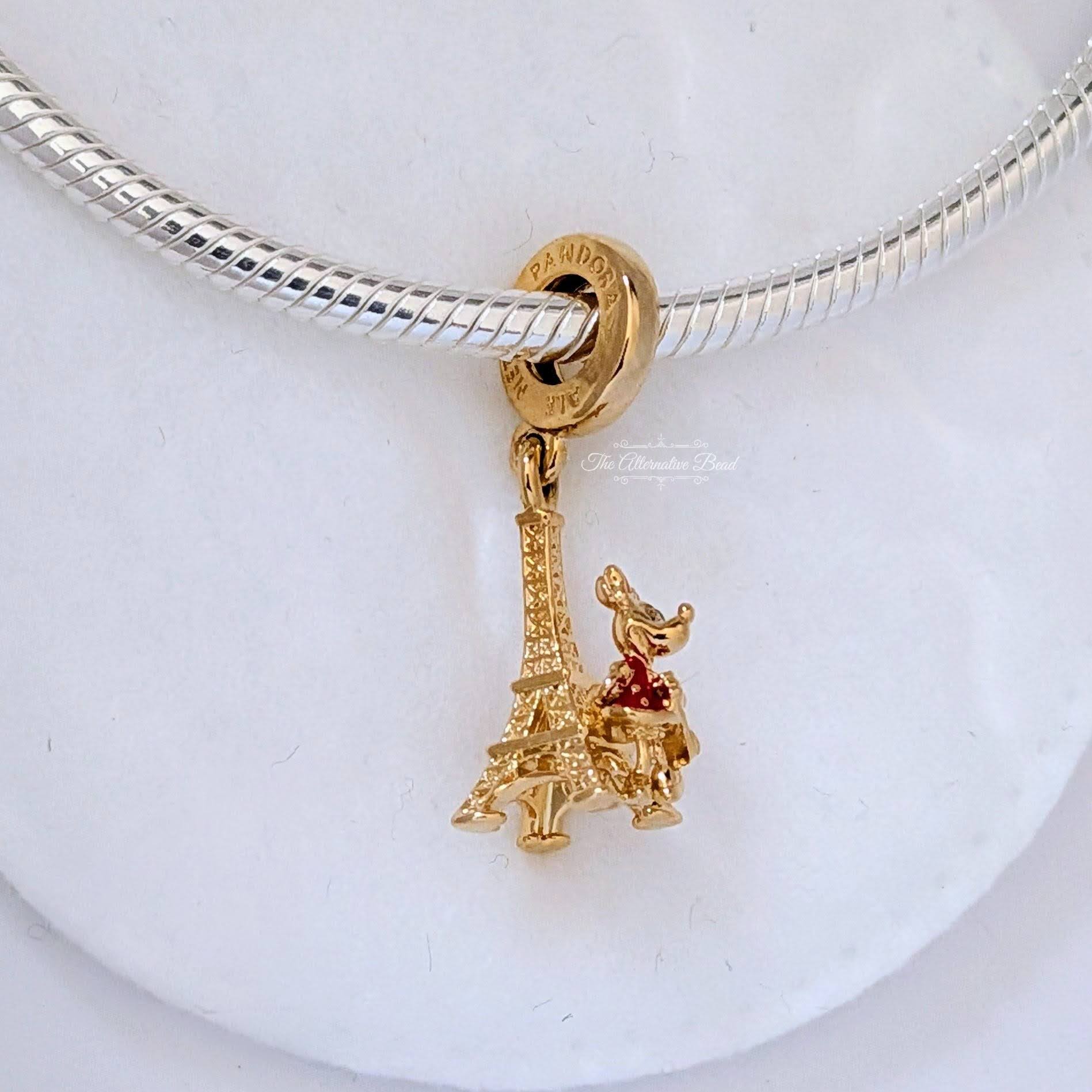 Disney x Pandora Minnie Mouse Eiffel Tower Dangle 14k Gold Plating gold and red gold-plated Dangle by The Alternative Bead. Your Jewelry Retailer from Germany