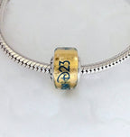 Disney x Pandora Disney Destination D23 2025 exclusive Murano Charm yellow; blue glass Bead by The Alternative Bead. Your Jewelry Retailer from Germany