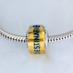 Disney x Pandora Disney Destination D23 2025 exclusive Murano Charm yellow; blue glass Bead by The Alternative Bead. Your Jewelry Retailer from Germany