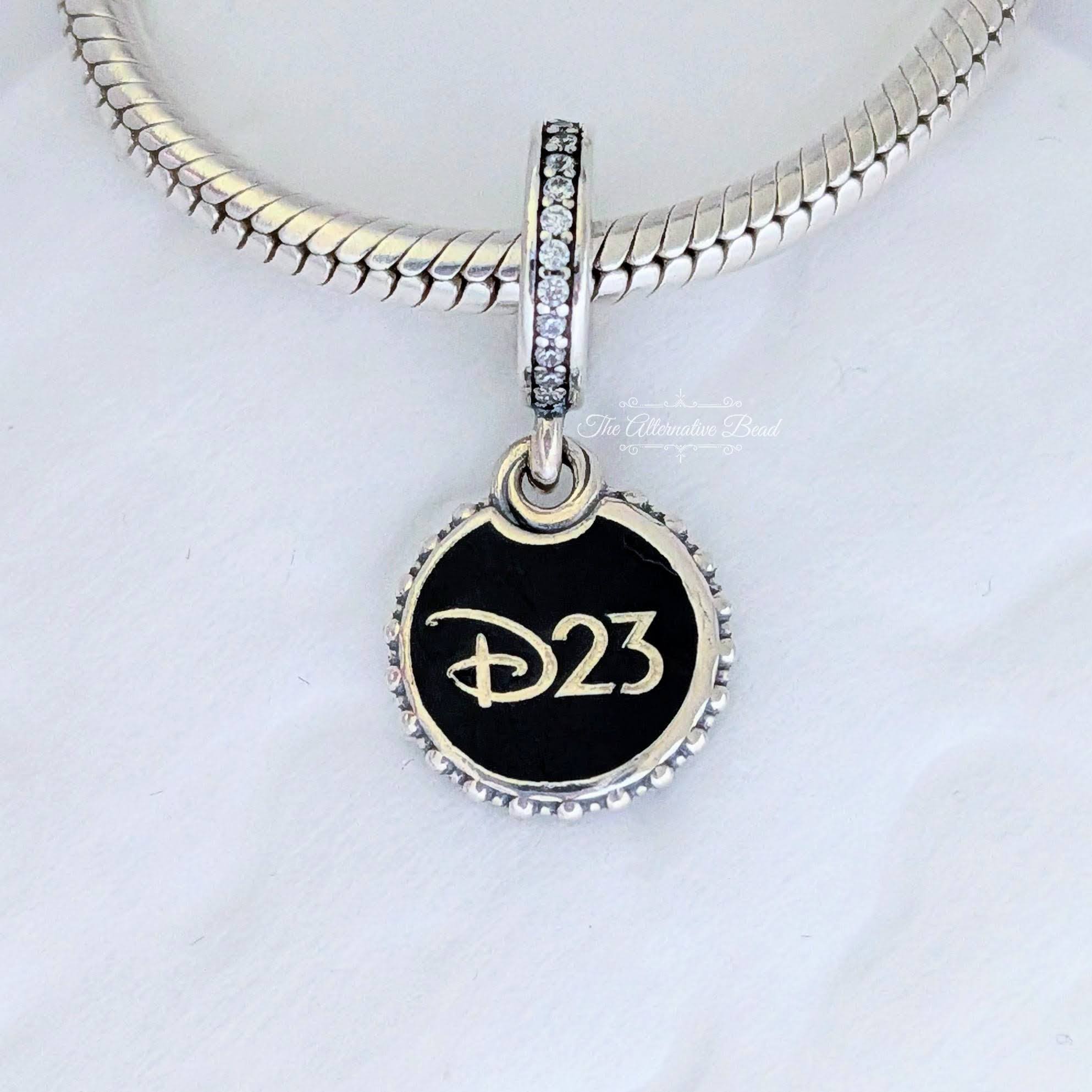 Disney x Pandora Disney Destination D23 2025 exclusive Minnie Mouse Dangle multicolor; black sterling-silver; enamel Dangle by The Alternative Bead. Your Jewelry Retailer from Germany