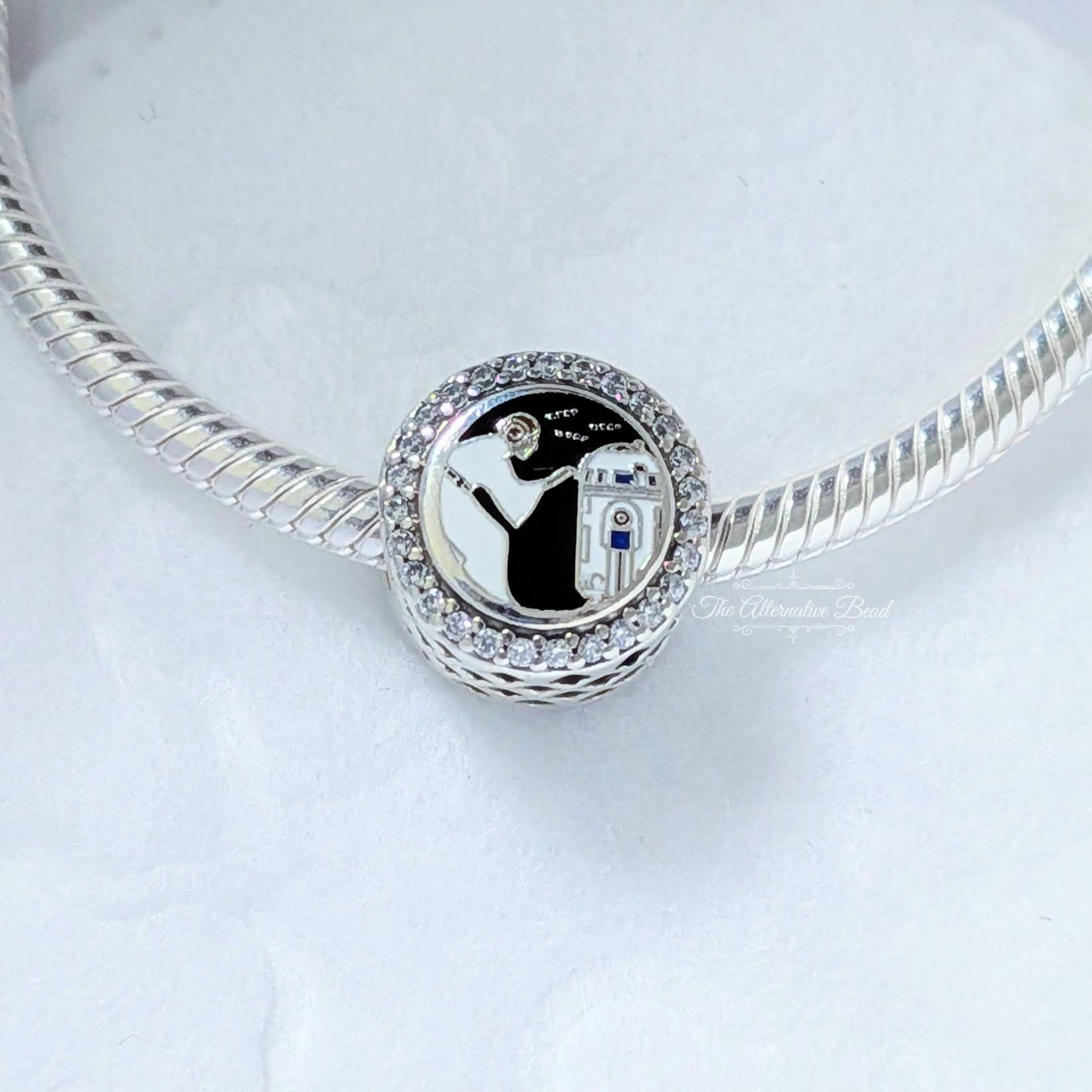 Star Wars x Pandora R2-D2 and Princess Leia Charm silver; black; white; blue sterling-silver Bead by The Alternative Bead. Your Jewelry Retailer from Germany