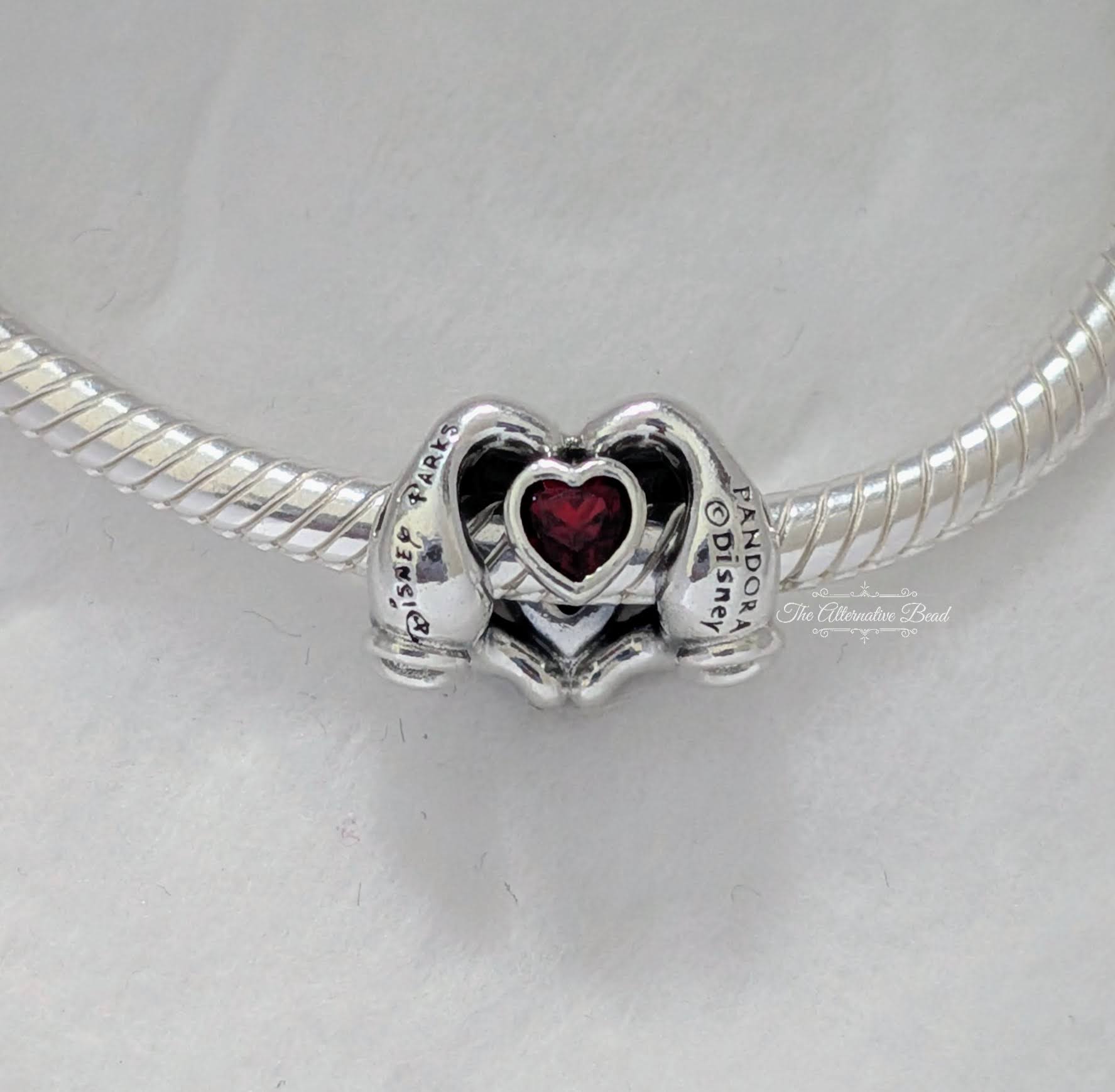 Disney x Pandora Mickey Mouse Heart Hands Charm silver; red sterling-silver; crystal Bead by The Alternative Bead. Your Jewelry Retailer from Germany