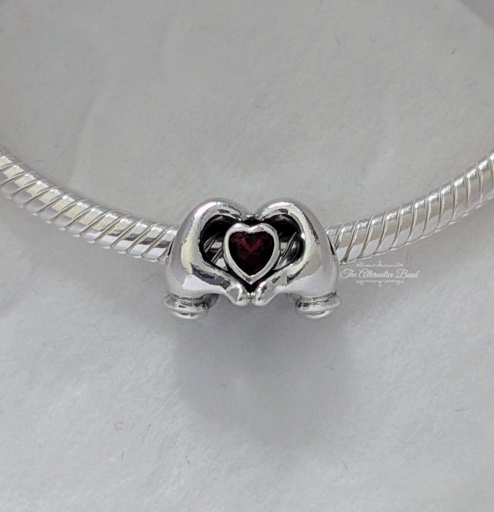 Disney x Pandora Mickey Mouse Heart Hands Charm silver; red sterling-silver; crystal Bead by The Alternative Bead. Your Jewelry Retailer from Germany