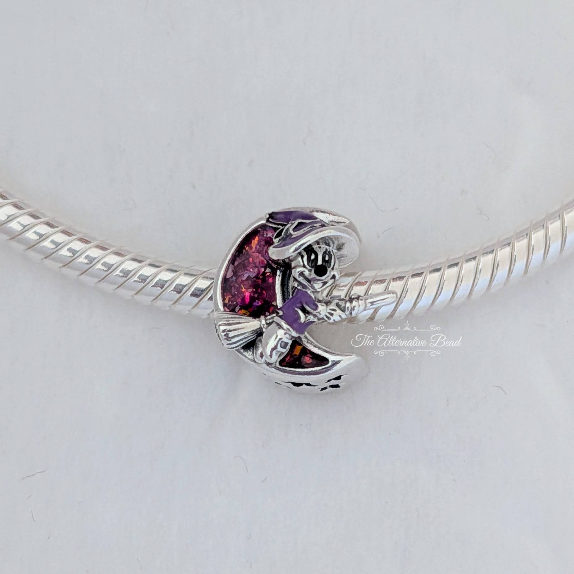 Disney x Pandora Minnie Mouse Glow-in-the-Dark Witch Halloween Charm silver; purple; glow-in-the-dark sterling-silver; enamel Bead by The Alternative Bead. Your Jewelry Retailer from Germany